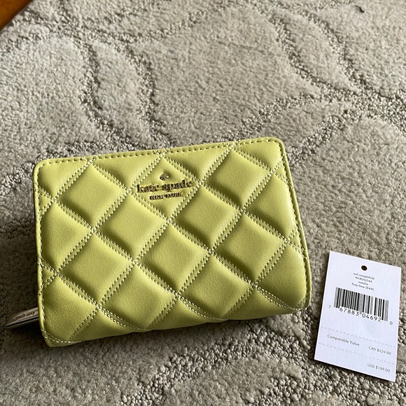 kate spade Handbags - Kate spade Natalia medium compact bifold wallet in frosty lime nwt